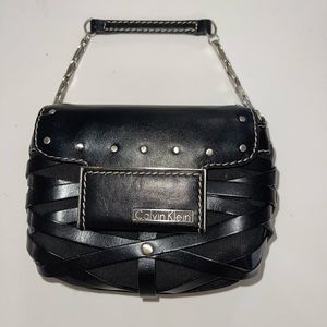 Calvin Klein mini bag.  Hand strap.  Wristlet, Black leather.